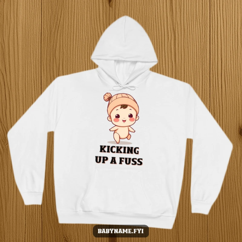 Funny hoodie showcasing a baby character in a cap, energetically kicking legs. A whimsical and warm apparel choice.