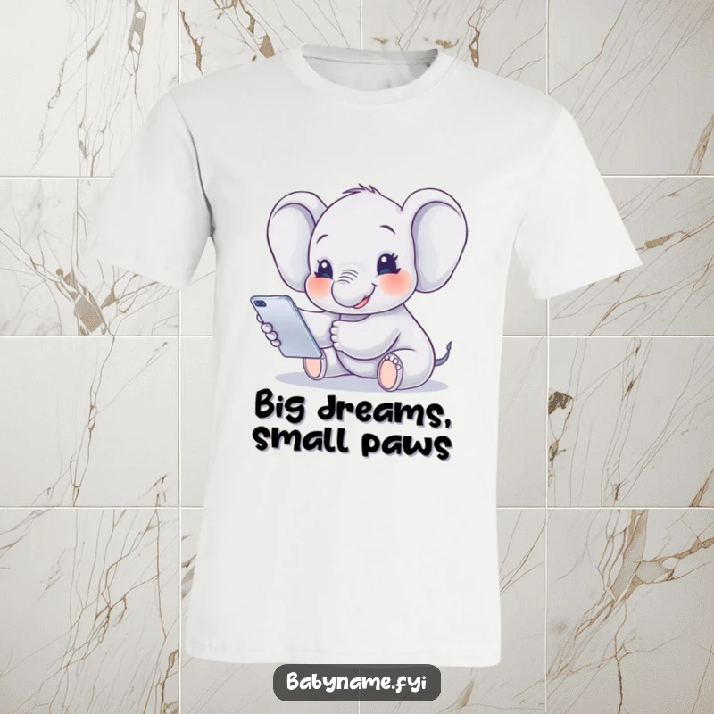 Funny T-Shirt showcasing a happy baby elephant reaching for a mobile, embodying playful curiosity and gentle humor.