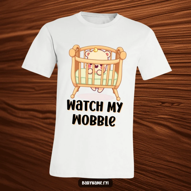 Funny t-shirt featuring a playful crib railing with one leg wobbling precariously, capturing the essence of parenthood humor.