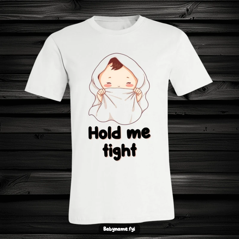 Funny baby blanket t-shirt showing tiny hands playfully tugging a soft blanket, symbolizing adorable clinginess.
